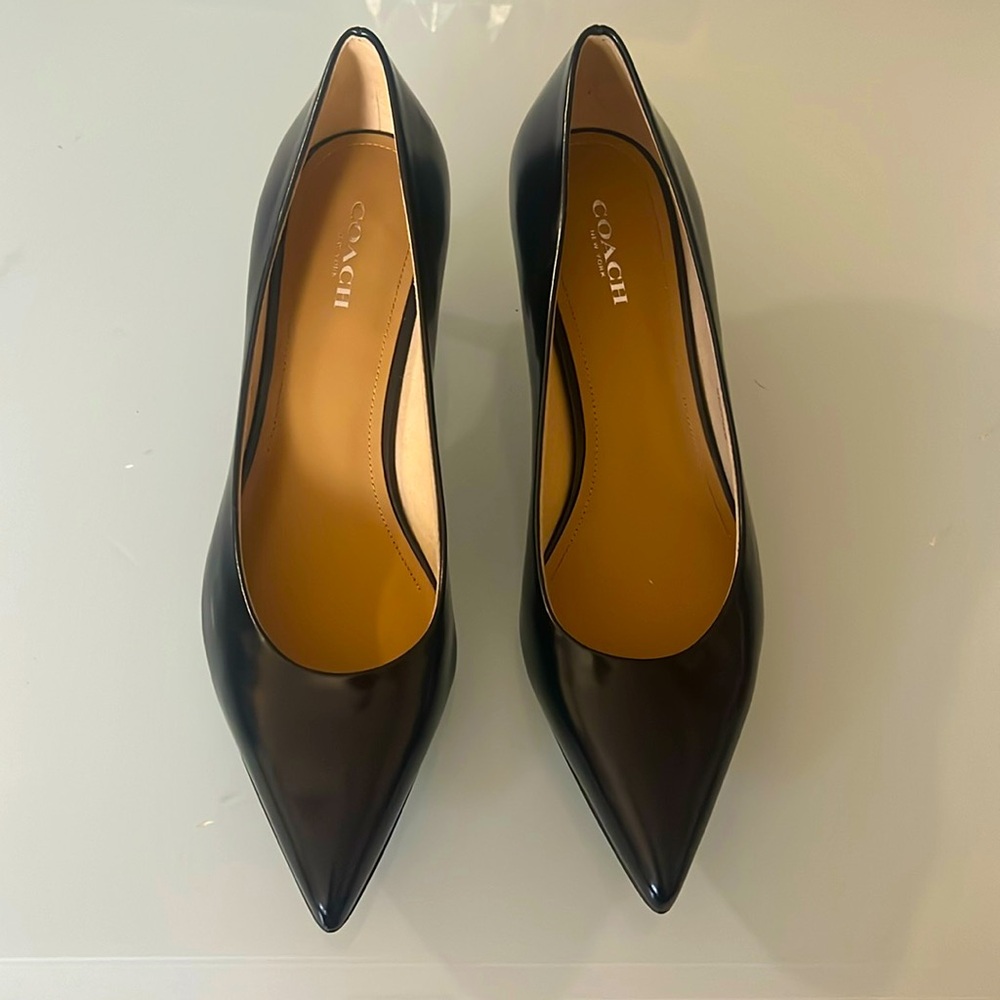 Coach’s shoes like new